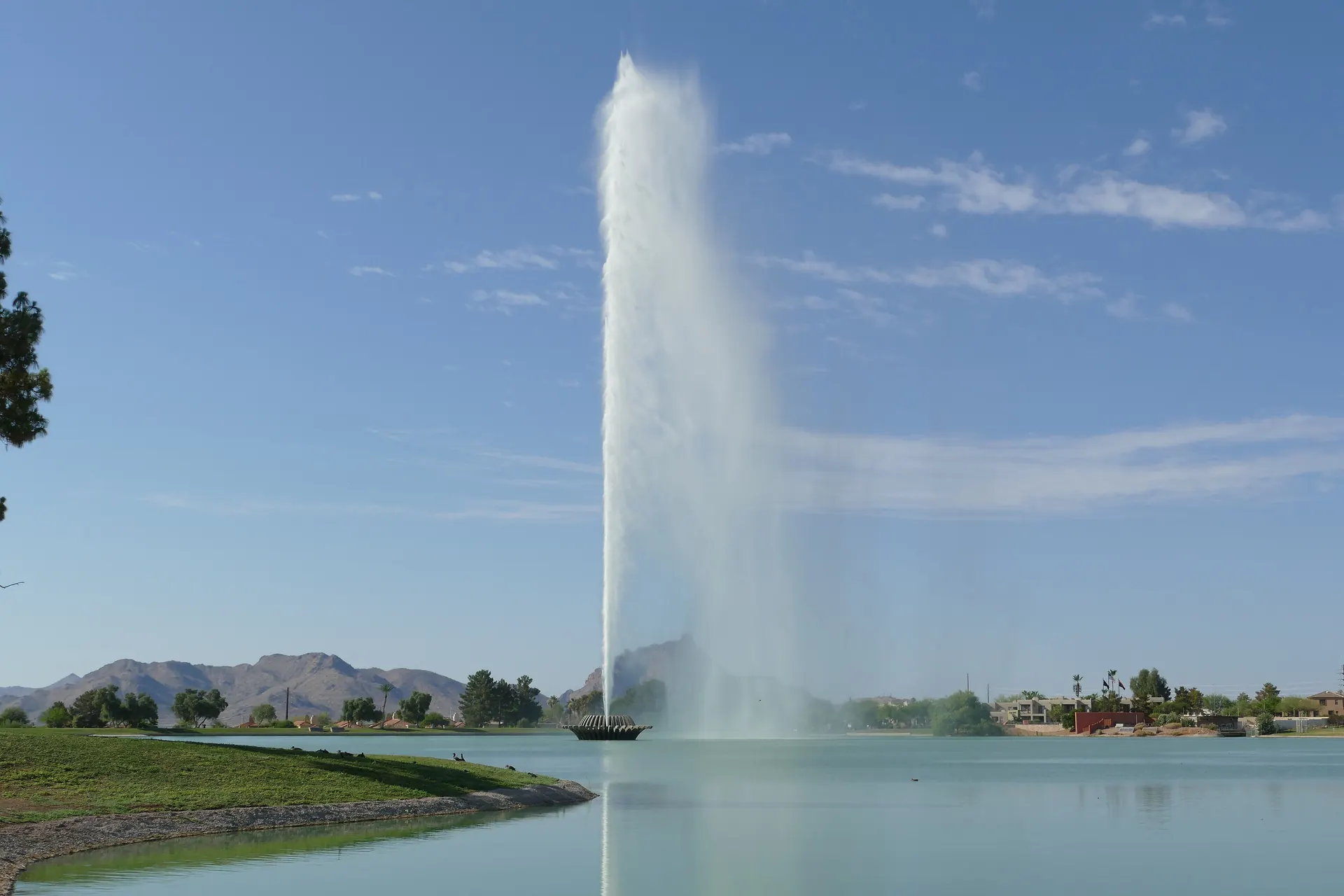 The fountain in Fountain Park, Fountain Hills, Arizona, a tall column of water rising over the lake