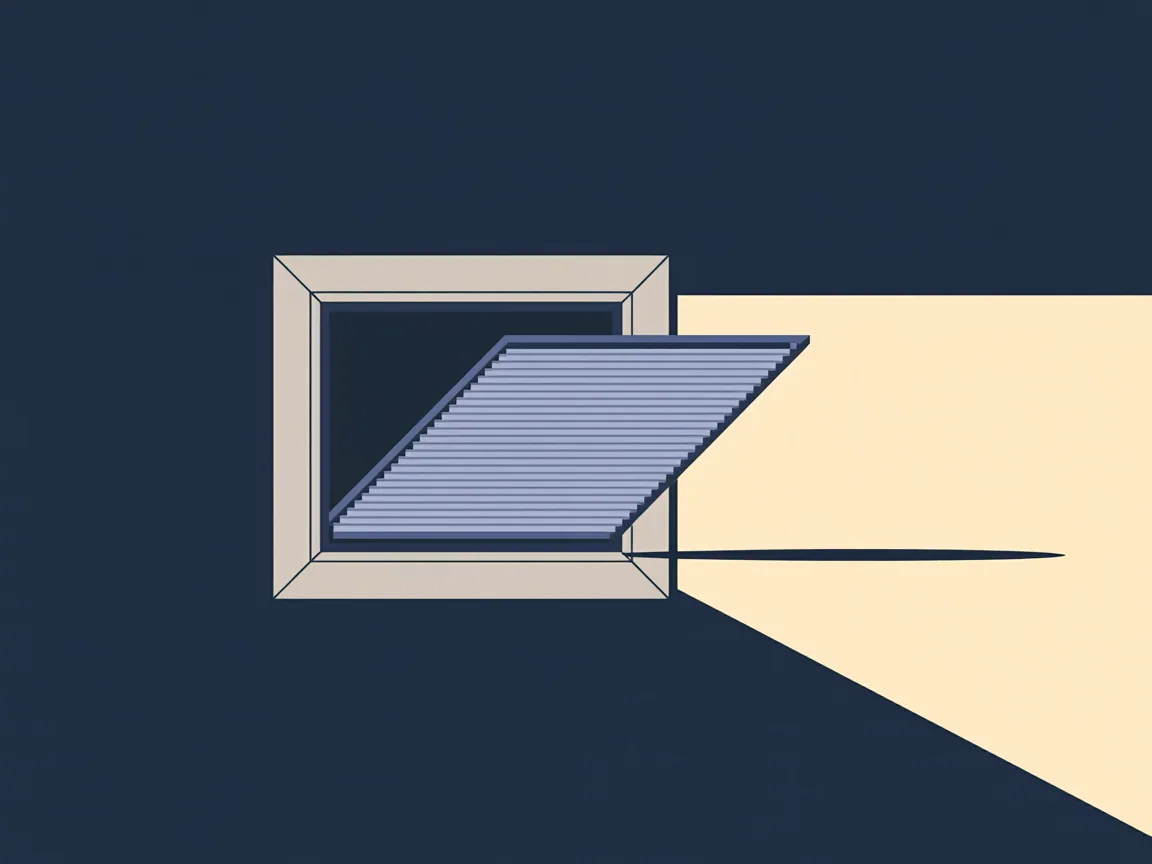 An open return air grille in a hallway wall with a pleated filter sliding into its metal rack and dust drifting toward the opening
